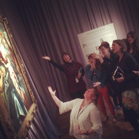 Portland Art Museum's Education team saying a dramatic goodbye to El Greco on its last day on view. Photo by Mike Murawski.