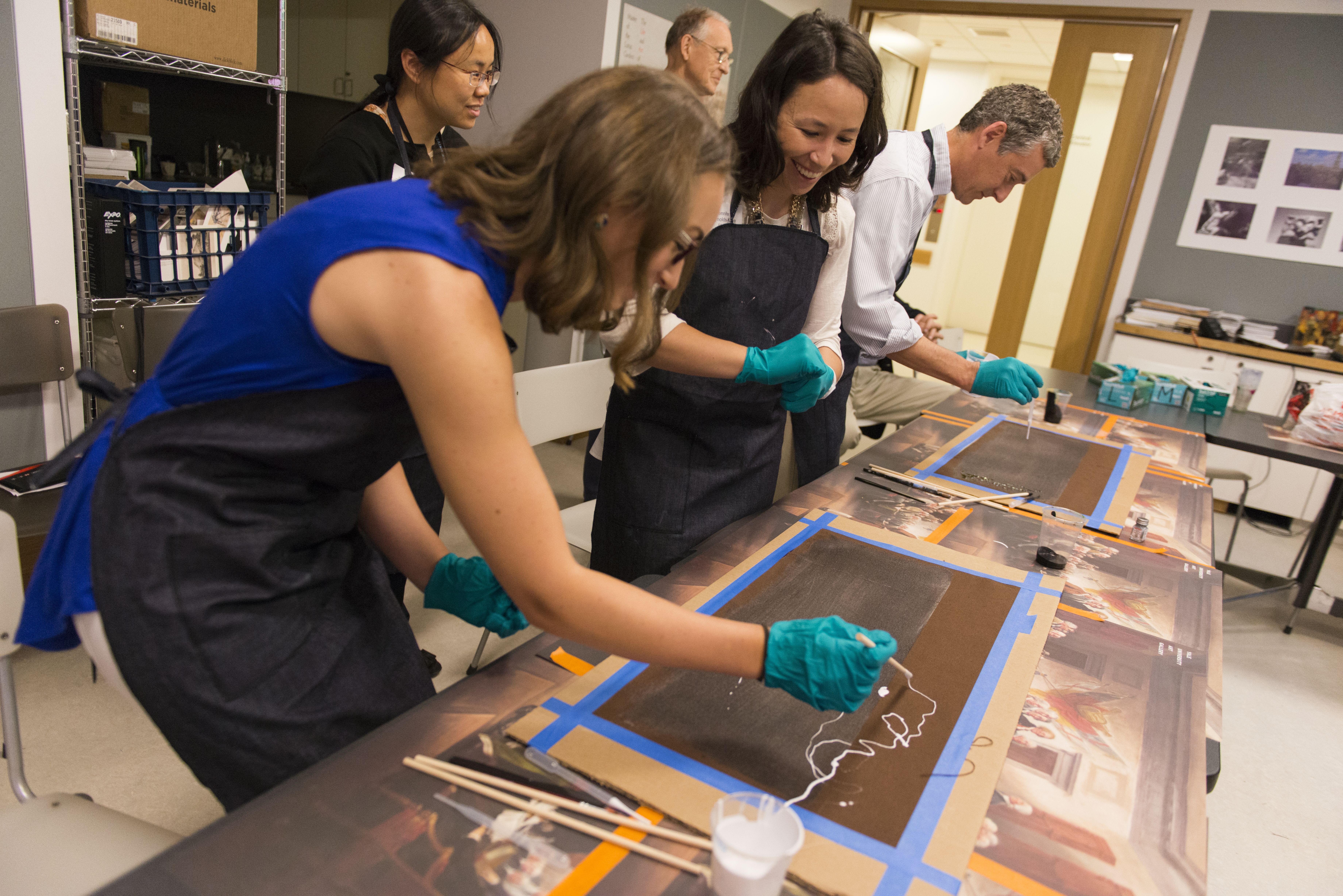 Staff explore Pollock’s materials in a studio session, led by Assistant Curator of Conservation Cindy Schwarz (not pictured.)